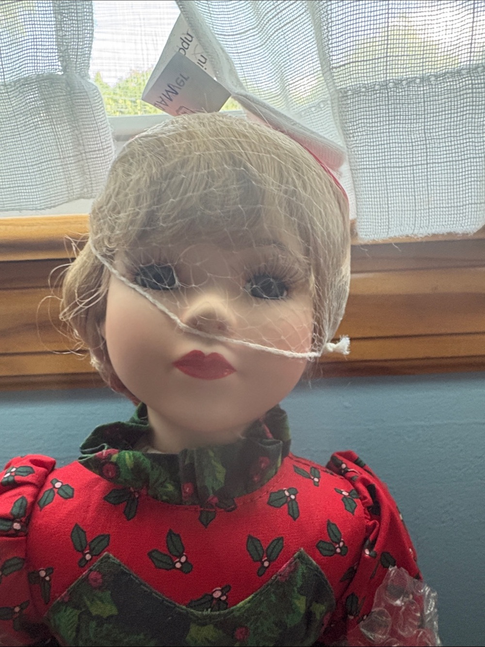 Porcelain doll with Christmas motif